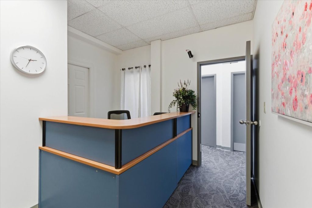 Blue reception desk at the clinic entrance